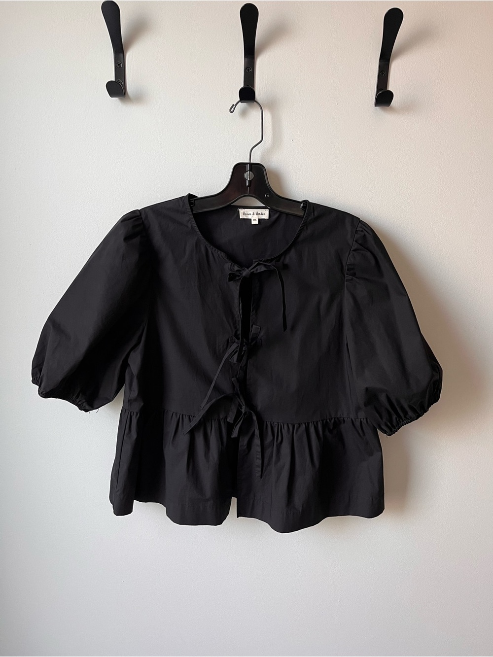 Aaron & Amber Black Tie-Front Puffy Sleeves Ruffle Hem Blouse
Size M